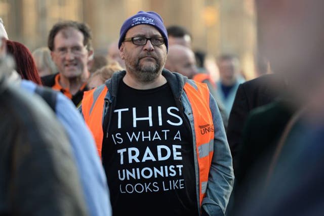 TUC members queue outside the Houses of Parliament to lobby against the Trade Union Bill