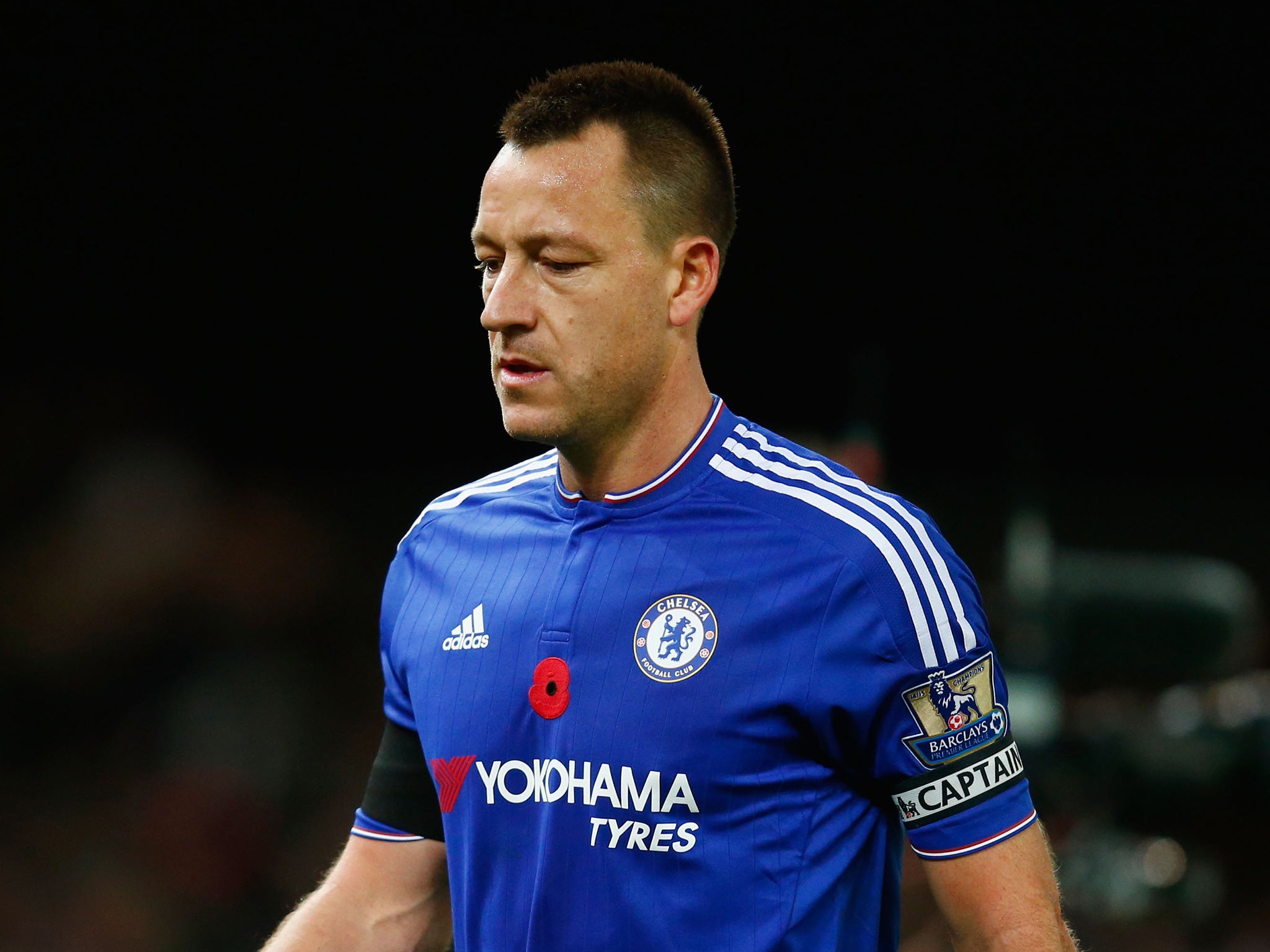 John Terry leaves the field dejected following the defeat at Stoke