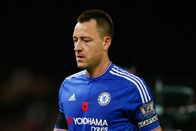 John Terry leaves the field dejected following the defeat at Stoke