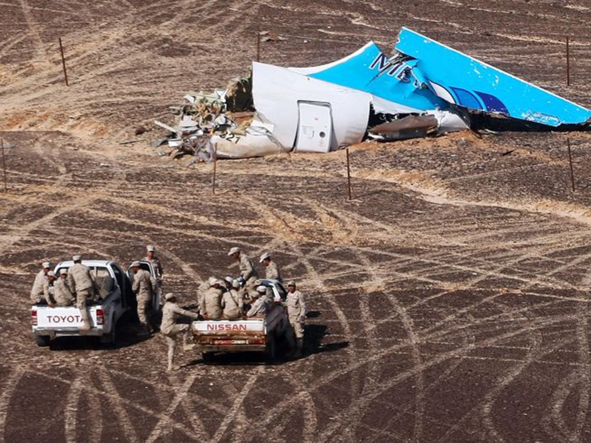 Egyptian military inspect the crash site
