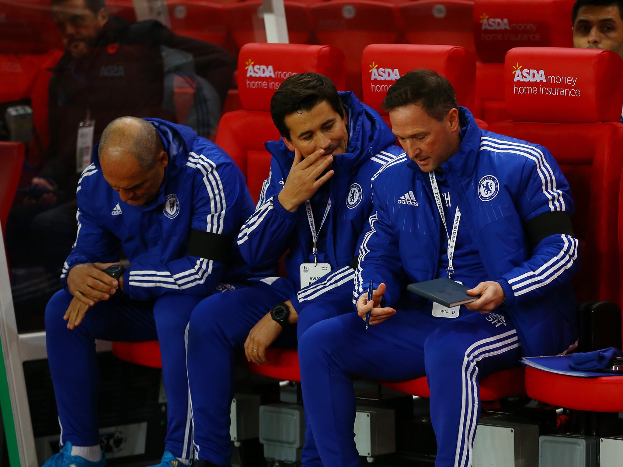 Chelsea first team assistant coaches Silvino Louro, Rui Faria and Steve Holland on the bench