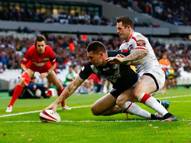Touch of class: Shaun Kenny-Dowall claims the only try of the game