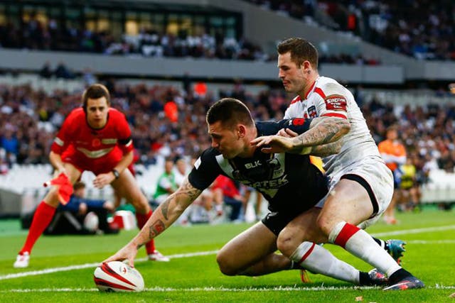 Touch of class: Shaun Kenny-Dowall claims the only try of the game