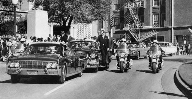 The license plates from the car carrying John F Kennedy when he was assassinated have been sold at auction