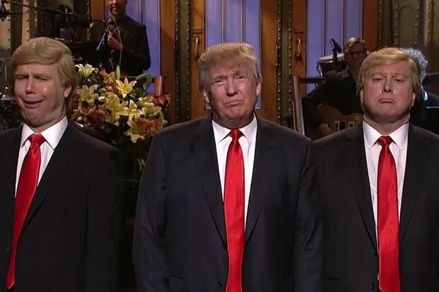 Donald Trump appearing on Saturday Night Live with his lookalikes