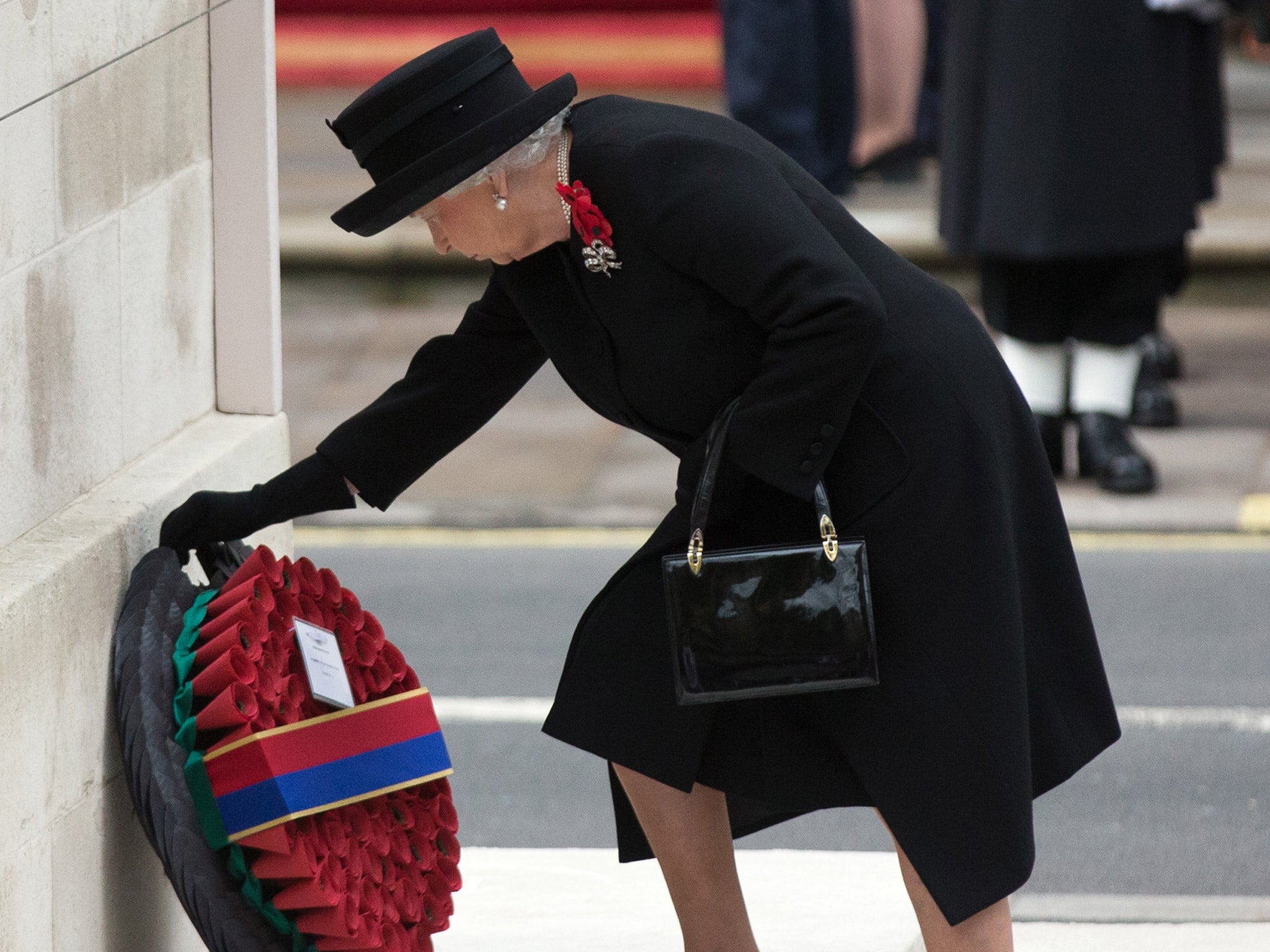 Queen Elizabeth II lays a wreath during the annual service Getty Images