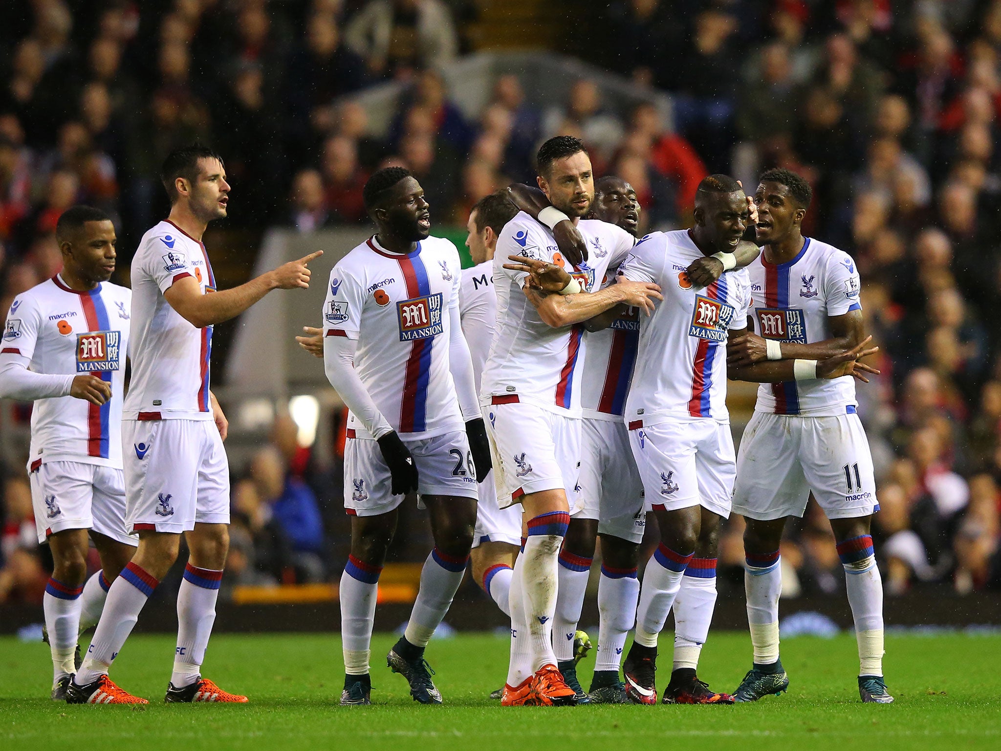 Yannick Bolasie is congratulated on his goal against Liverpool