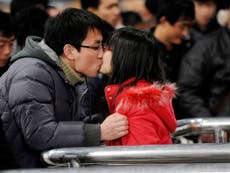 Chinese university bans student couples from holding hands or feeding each other in canteen