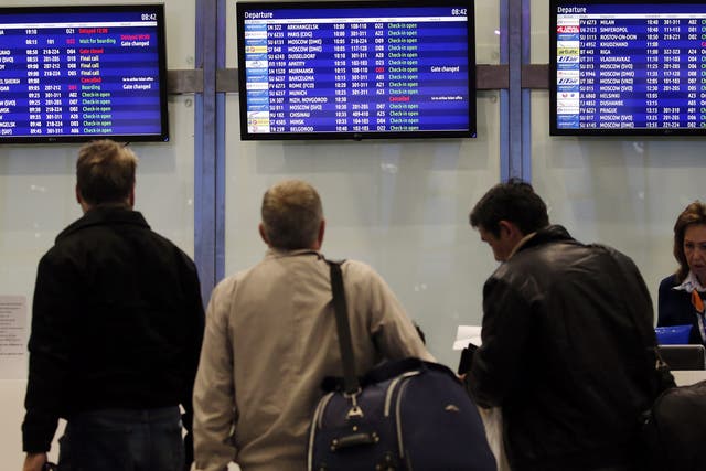 Passengers check monitors as flights to Sharm el-Sheikh appear as cancelled at Pulkovo airport in St. Petersburg, Russia on 7 November