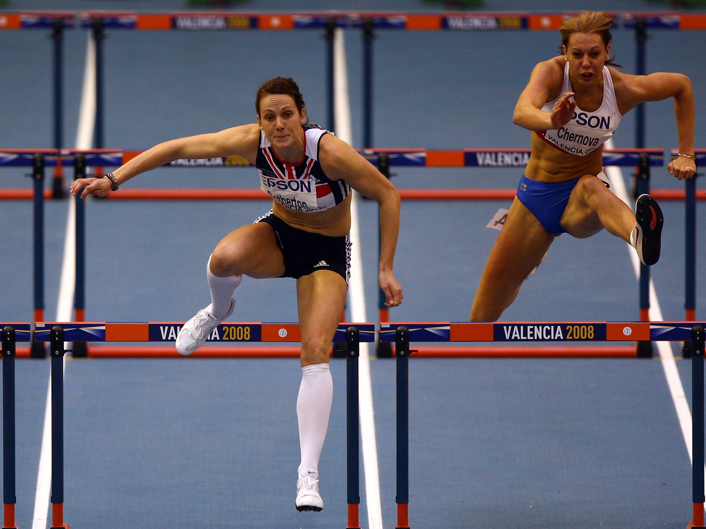 Kelly Sotherton (left) races against the Russian Tatyana Chernova, who was later banned