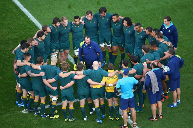 Michael Cheika holds court with the Australia squad during the recent World Cup