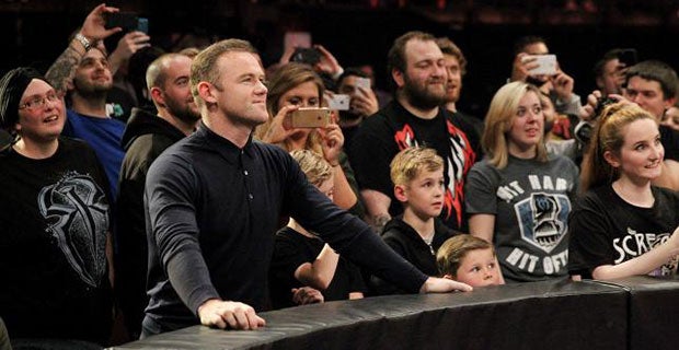 Rooney stands and stares as the match begins