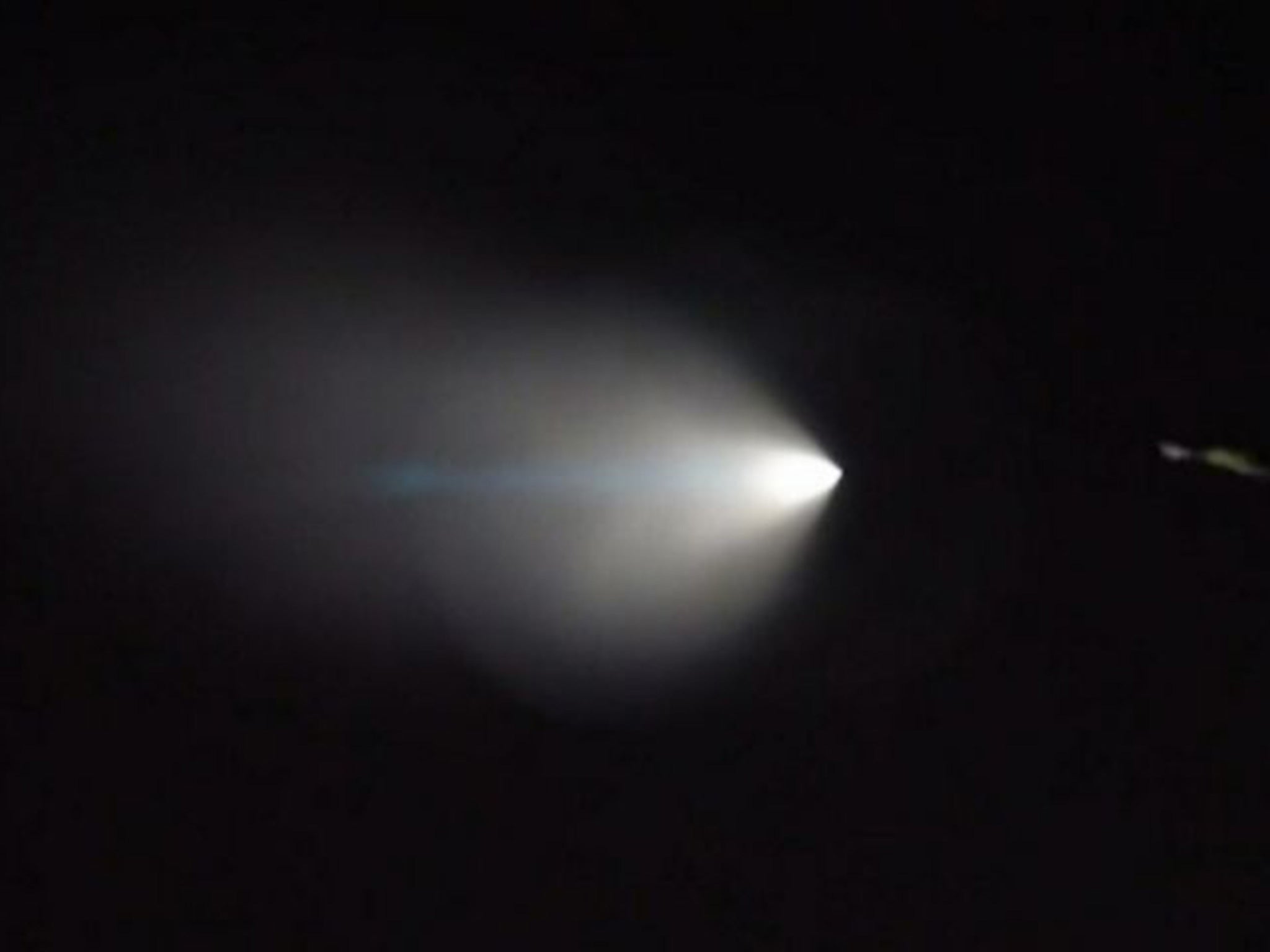 This image from video shows an unarmed missile fired by the U.S. Navy from a submarine off the coast of Southern California