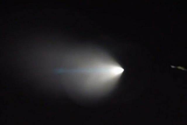 This image from video shows an unarmed missile fired by the U.S. Navy from a submarine off the coast of Southern California