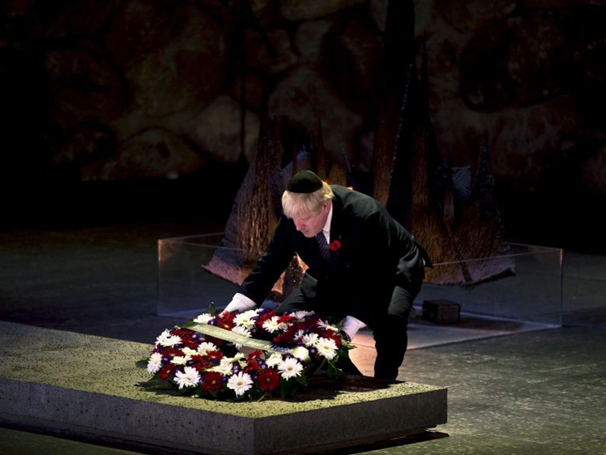 London Mayor Boris Johnson lays a wreath during a ceremony in the Hall of Remembrance at Yad Vashem Holocaust Memorial in Jerusalem