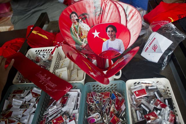 Fans designed with the image of Myanmar opposition leader Aung San Suu Kyi are seen at a souvenir shop of the National League for Democracy party (NLD) in Yangon on November 10, 2015