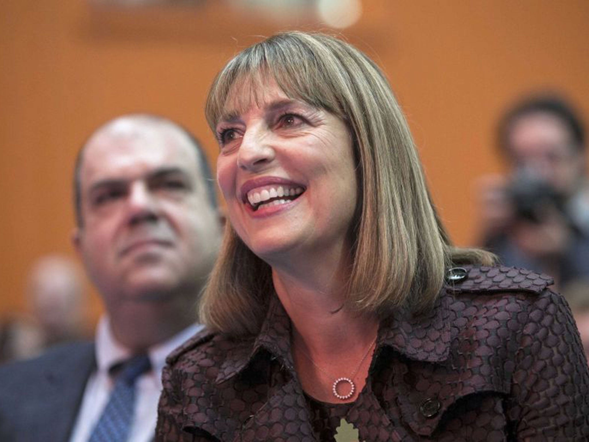 Easyjet CEO Carolyn McCall (R) and founder Stelios Haji-Ioannou attend a media event to celebrate 20 years in business at Luton Airport, southern England, November 10, 2015.