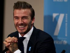 Beckham dazzles deprived children in street football match