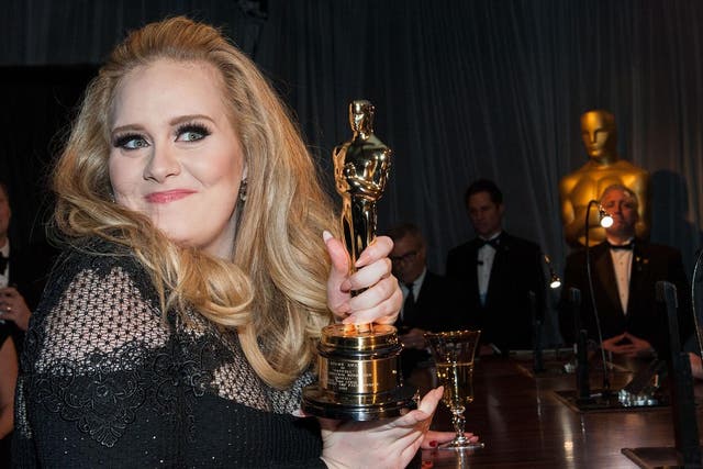 Music fans shunning CDs and downloads has hit the record label behind Adele 