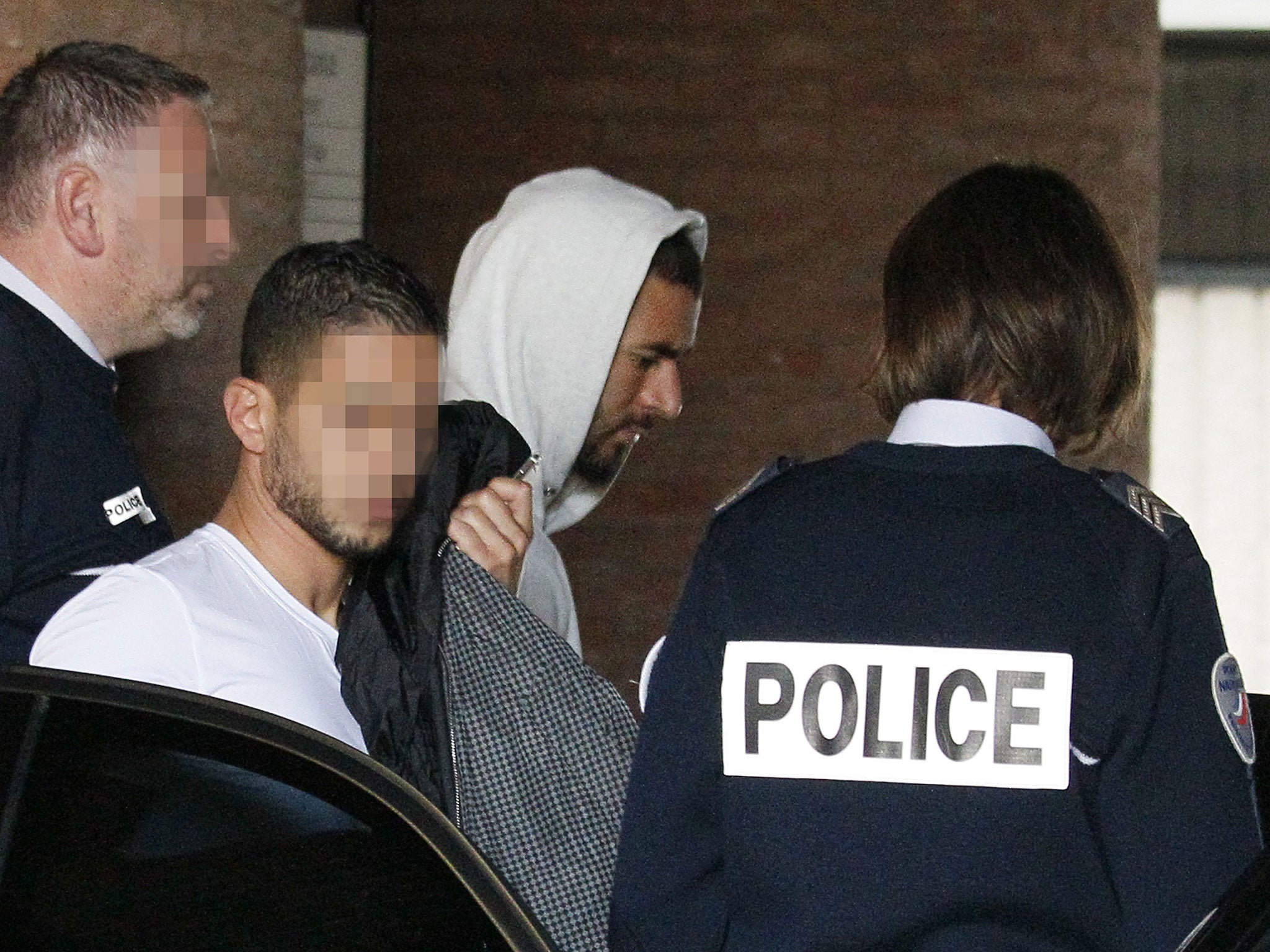 Karim Benzema leaves a French court house in Versailles