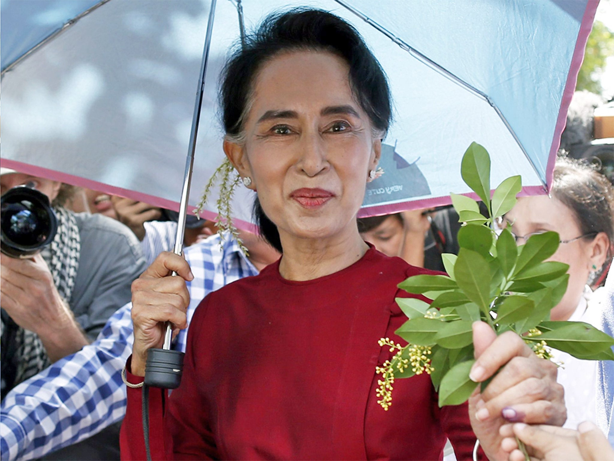 Aung San Suu Kyi said she will be running the country