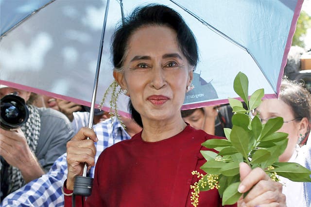 Aung San Suu Kyi said she will be running the country