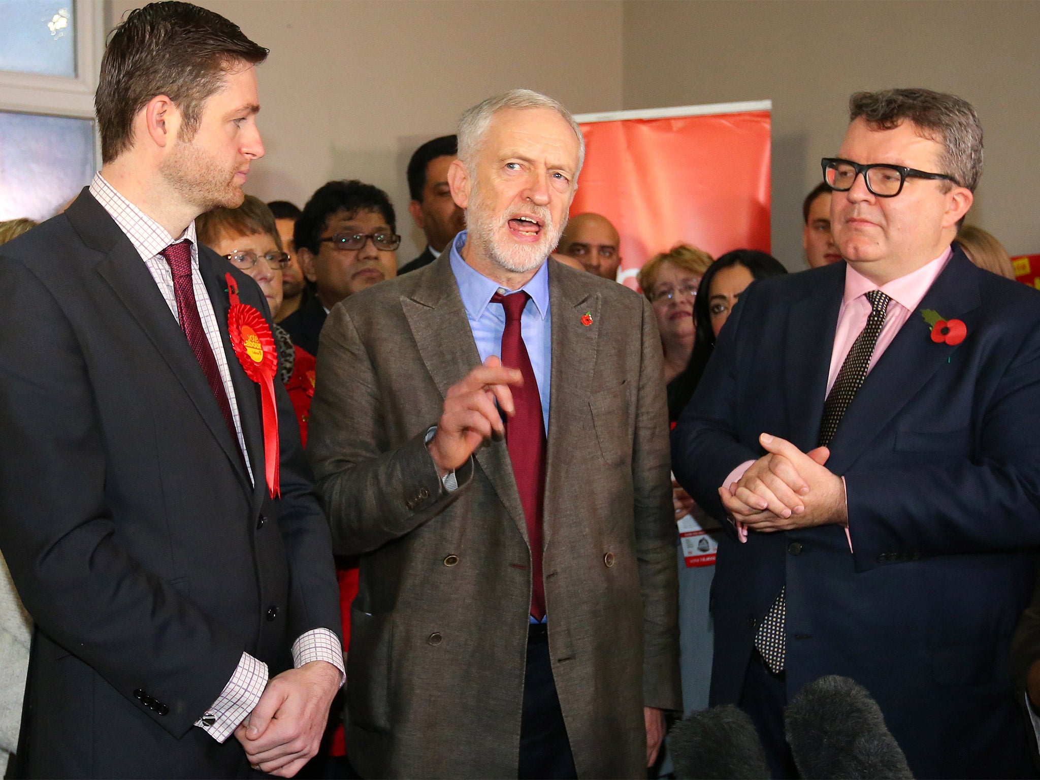 Labour leader Jeremy Corbyn with Deputy Leader Tom Watson, right, and candidate Jim McMahon, in Oldham, last week