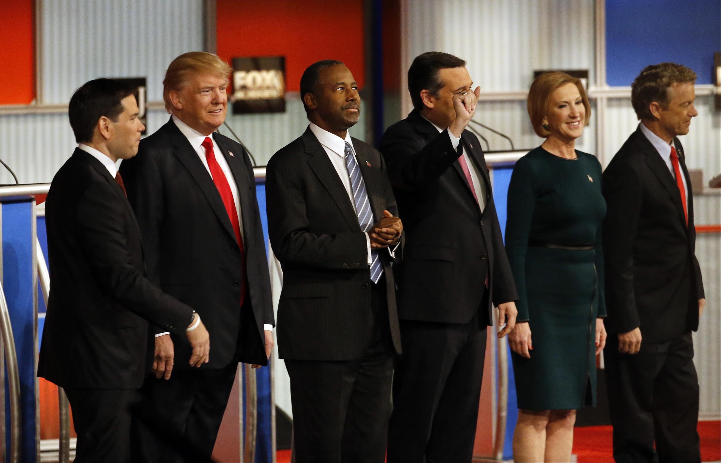 The leading candidates take the stage in Milwaukee. Morry Gash/AP