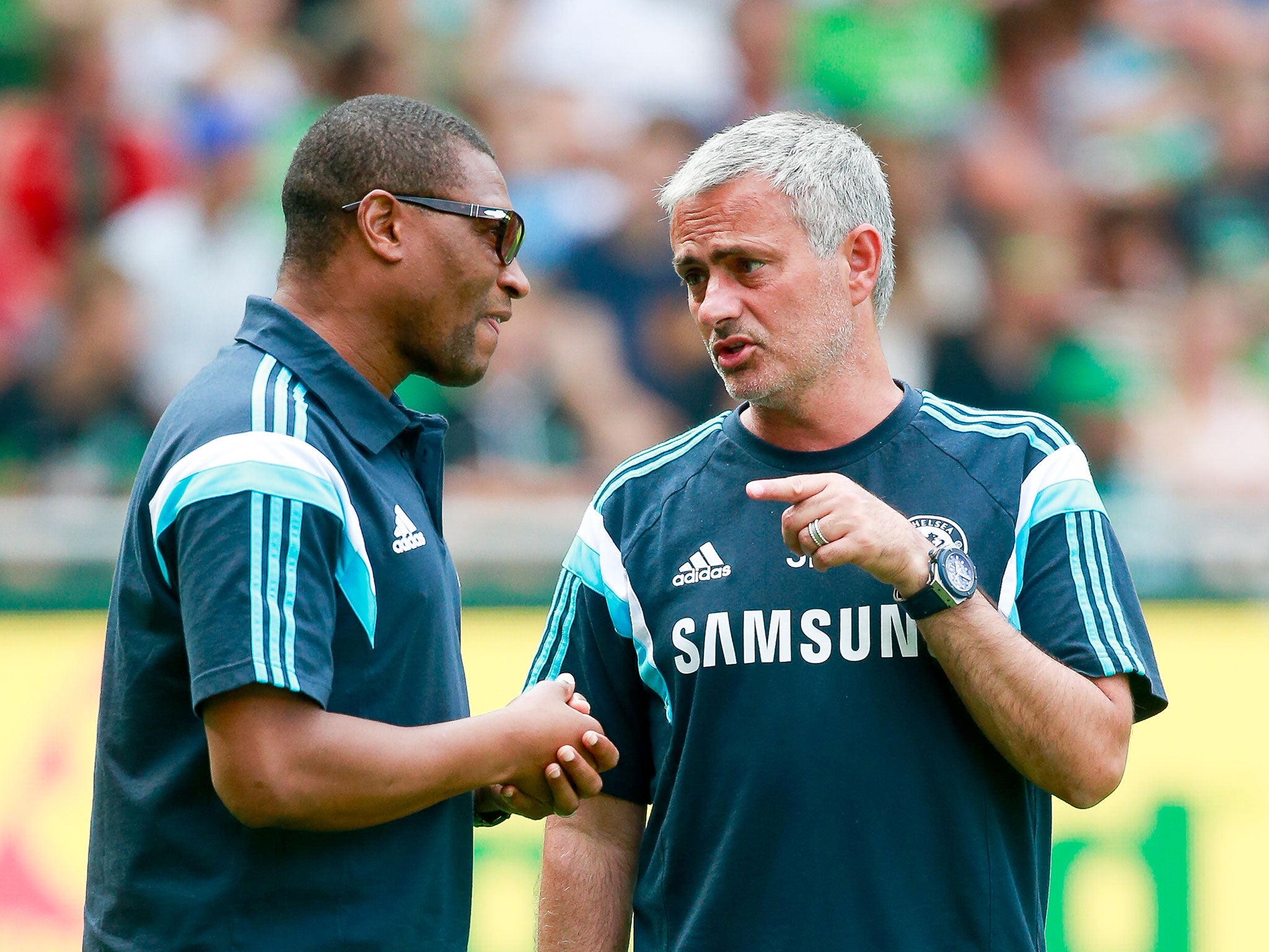 Michael Emenalo alongside Chelsea manager Jose Mourinho
