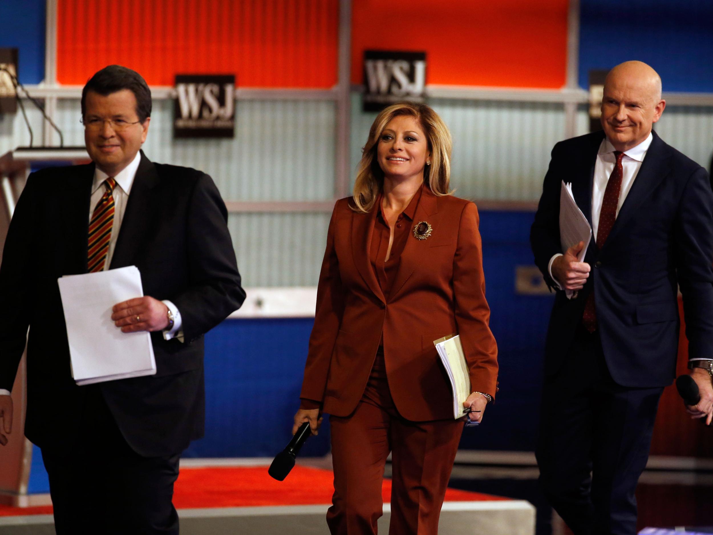 Moderators Neil Cavuto, left, Maria Bartiromo and Gerard Baker arrive on stage before the Republican presidential debate