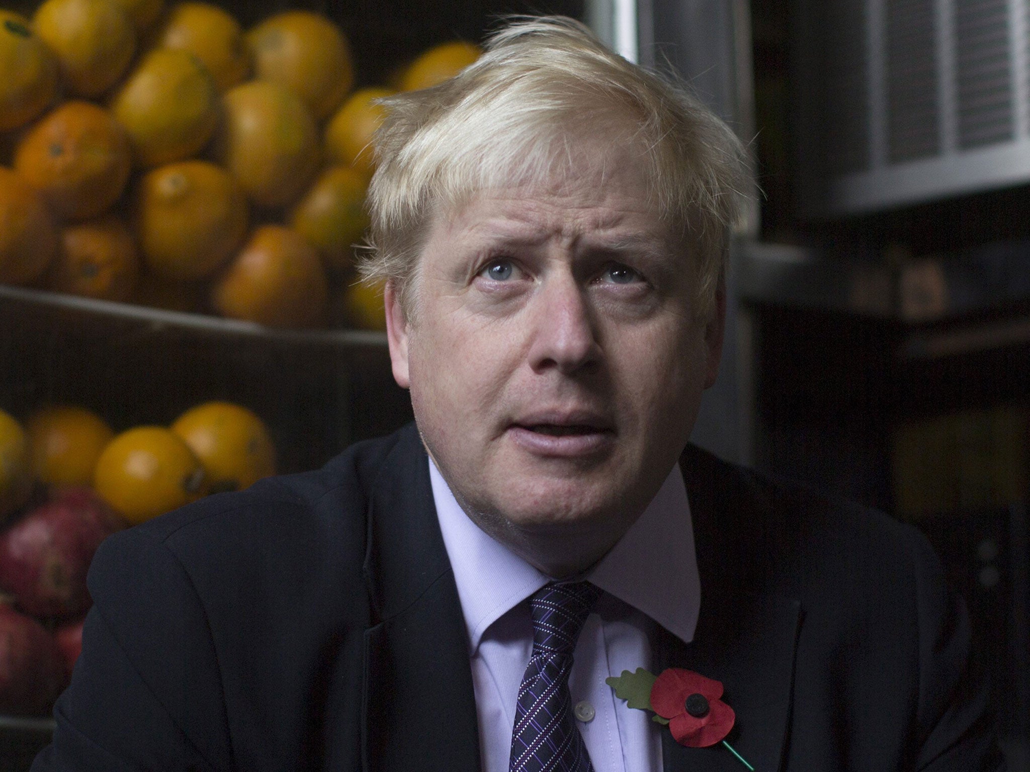 Mayor of London Boris Johnson in a Palestinian cafe during a tour of the Old City of Jerusalem, 11 November 2015.