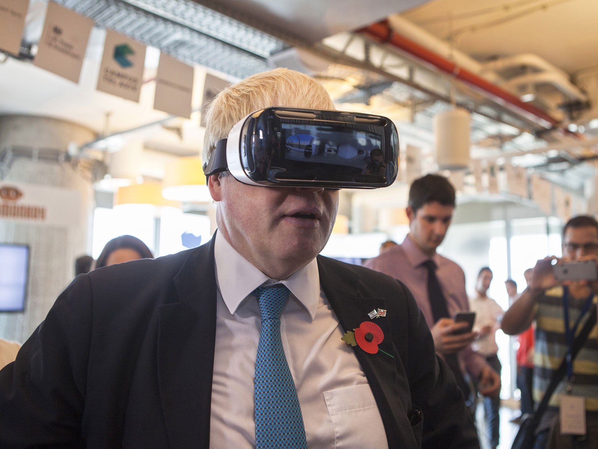 Mayor of London Boris Johnson wears virtual reality goggles during a visit to the Google offices in Tel Aviv on Monday