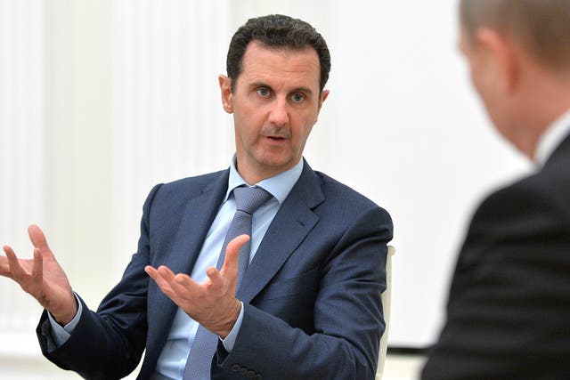 President Bashar al-Assad speaks with Vladimir Putin last month