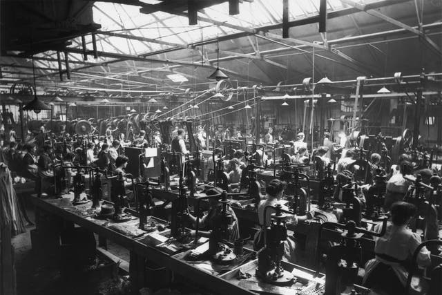 Hundreds of workers punch buttons out of sheet metal in a Birmingham factory in the early 1900s. Unemployment averaged below 5 per cent in 22 of the years between 1881 and 1914
