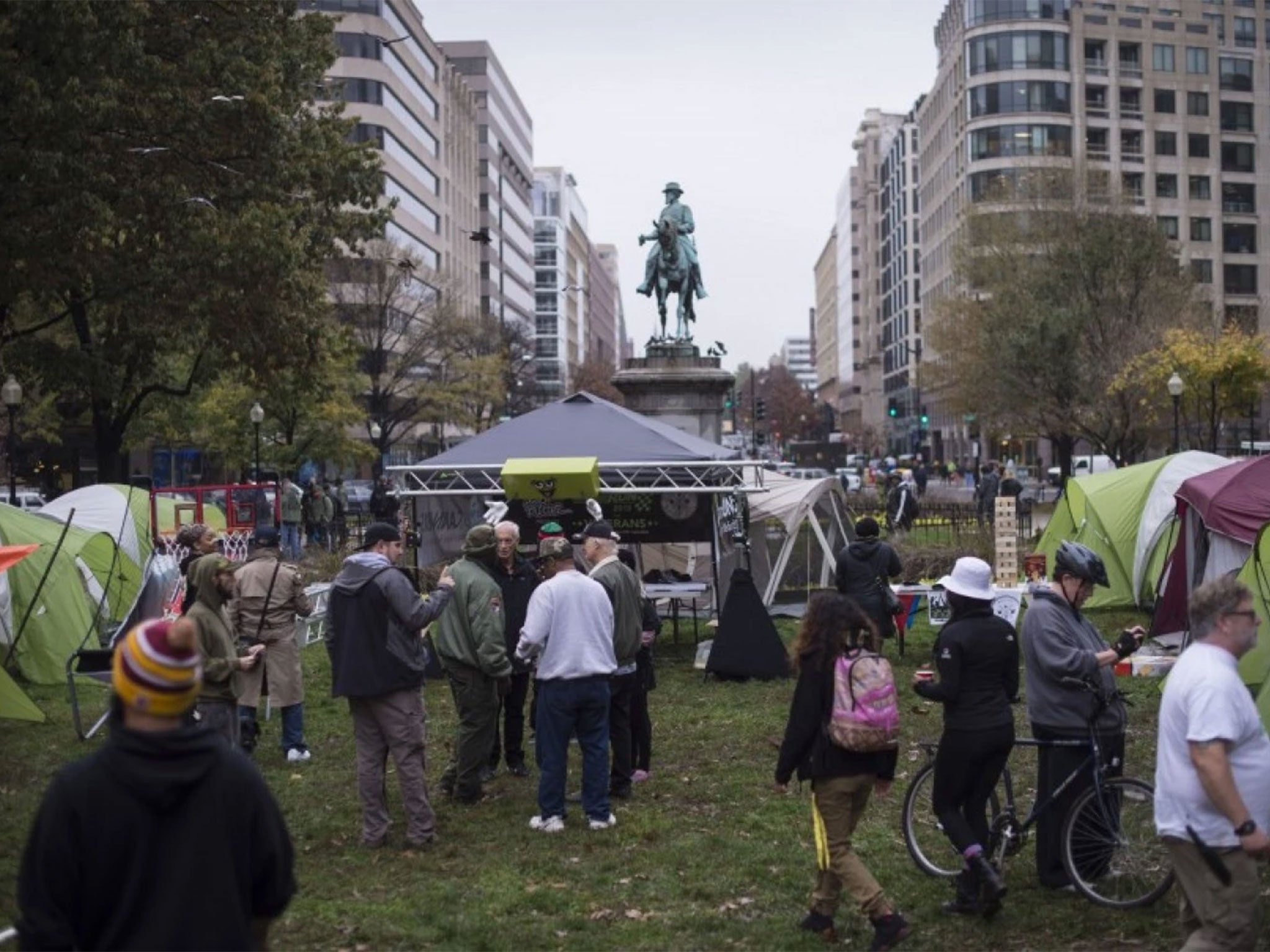 People set up for a Weed For Warriors Project event on Tuesday at McPherson Square in Washington