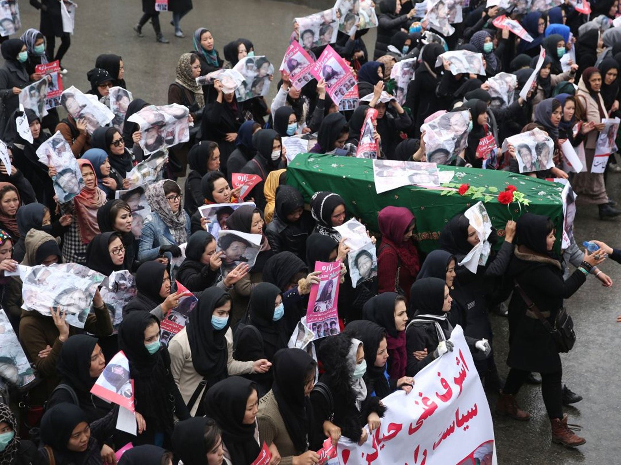 Women carried the coffin of nine-year-old Shukira through Kabul