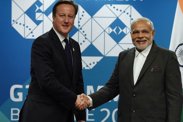 David Cameron (left) shakes hands with Indian Prime Minister Narendra Modi during a bilateral meeting at the Brisbane Convention last year