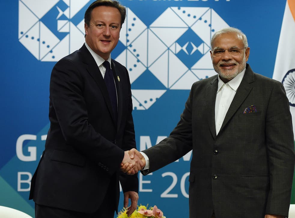 David Cameron (left) shakes hands with Indian Prime Minister Narendra Modi during a bilateral meeting at the Brisbane Convention last year
