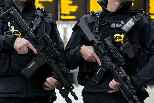 Armed officers from the British Transport Police.