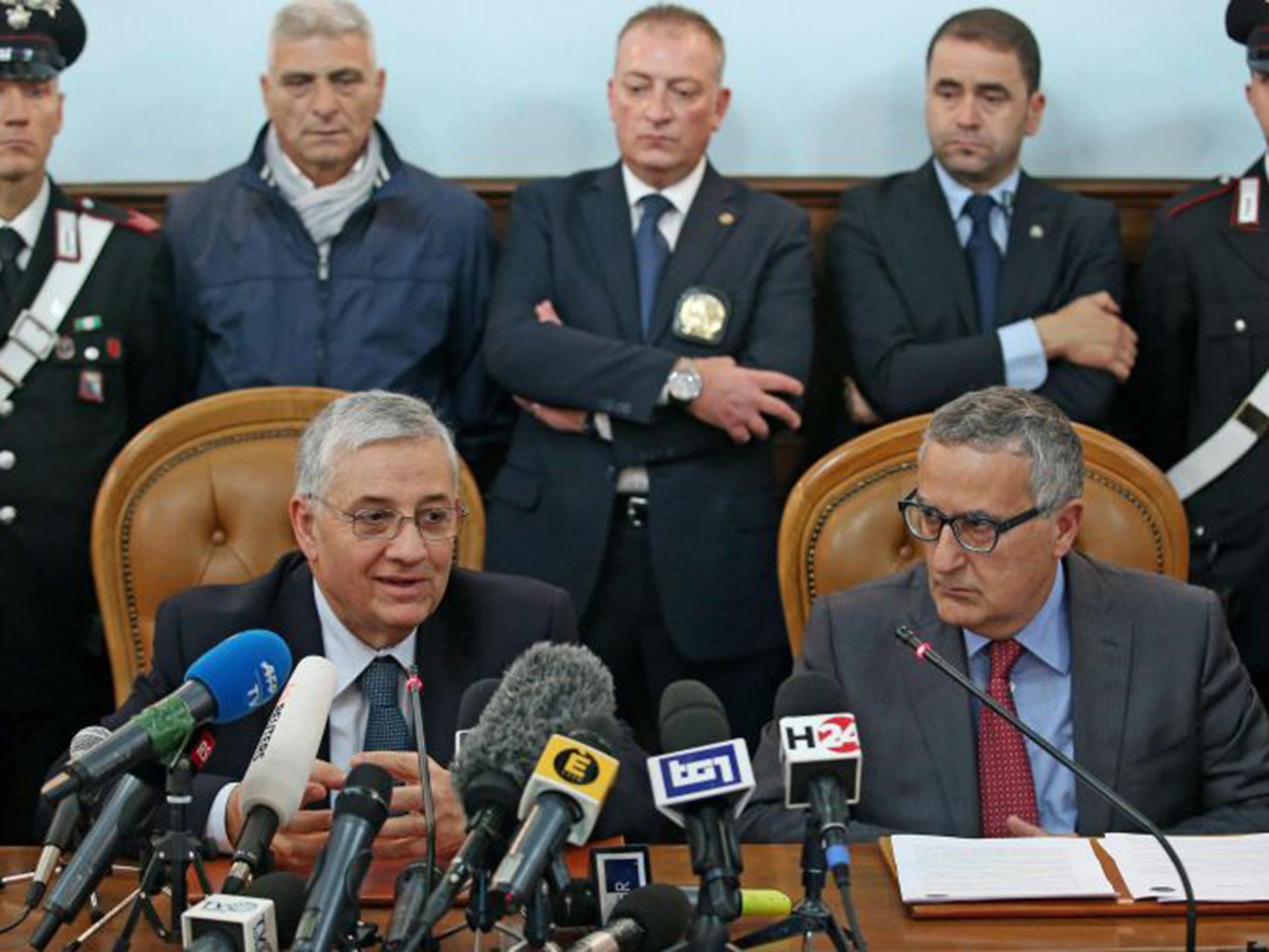 Public prosecutor of Rome, Giuseppe Pignatone (L) after the anti-terrorism operation in which 17 arrest warrants for Iraqi Kurds on terrorism related charges