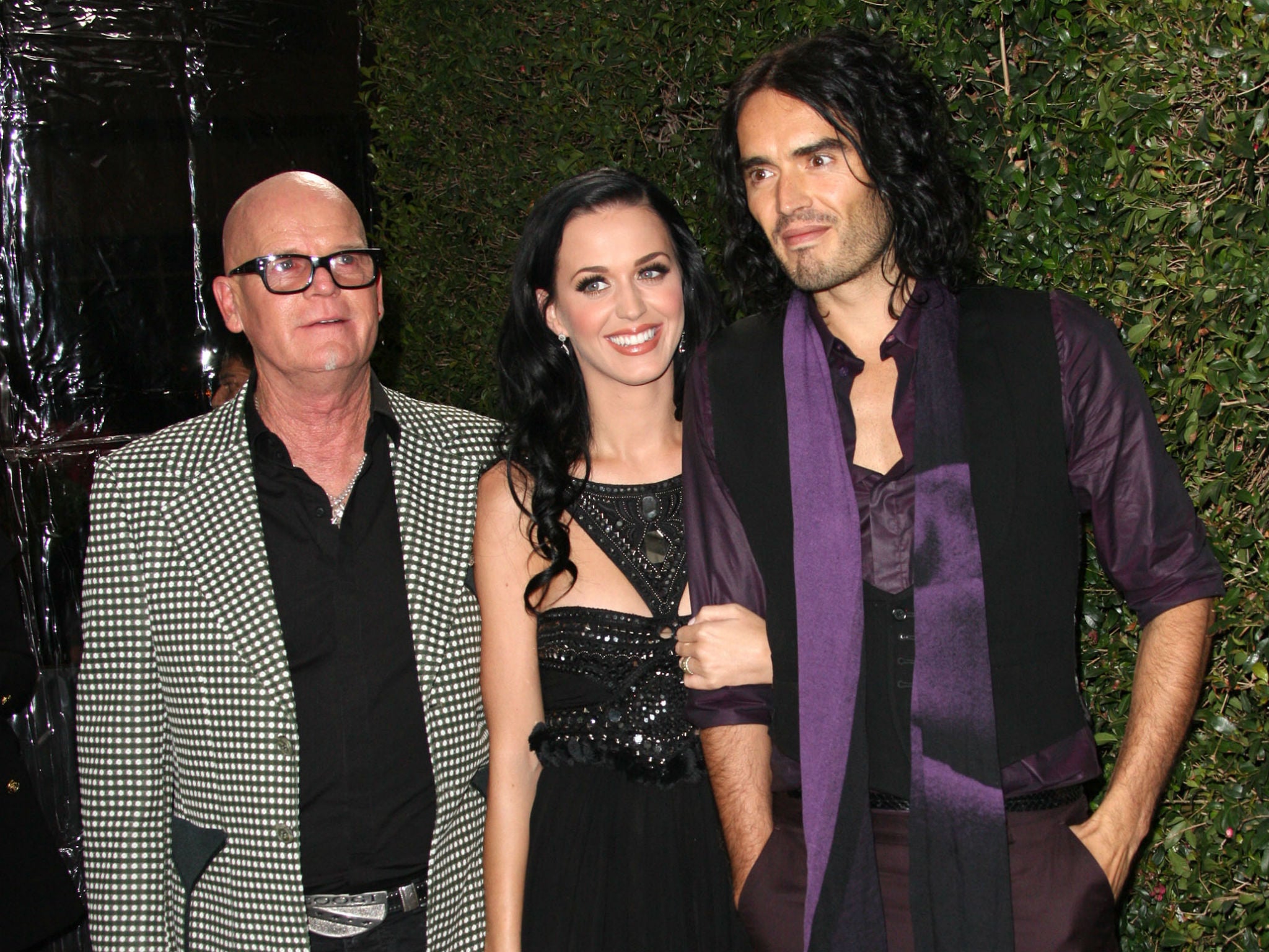Perry with her father and ex-husband Russell Brand in 2011