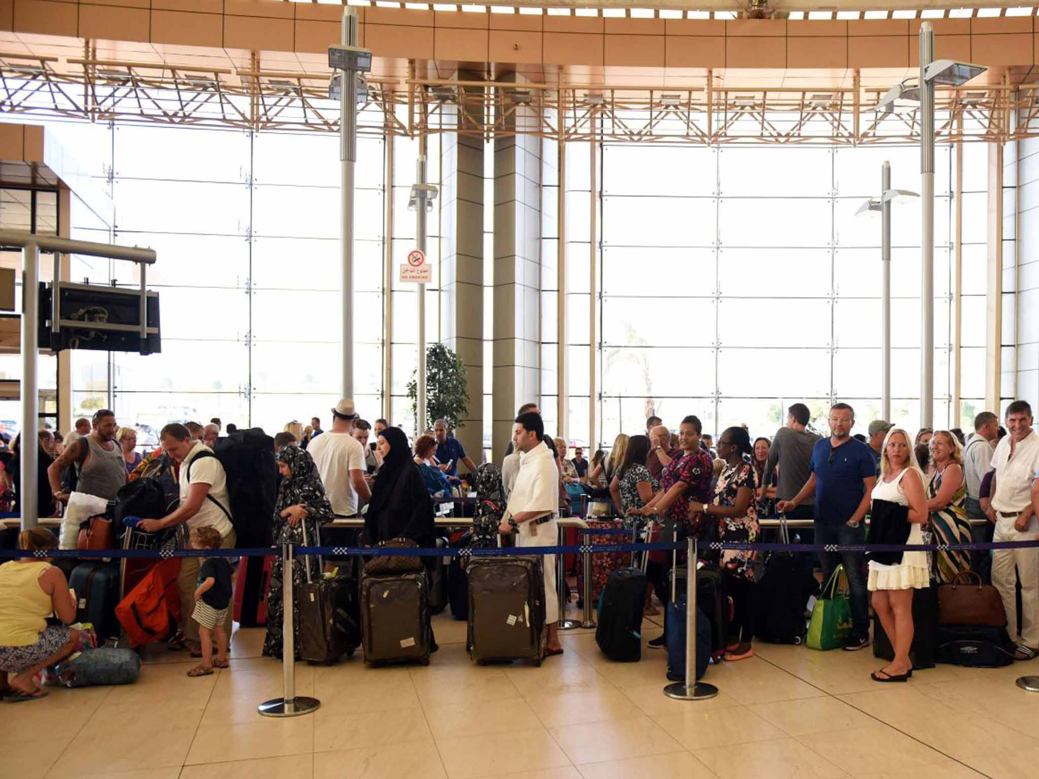 Form a queue: tourists at Sharm el-Sheikh airport earlier this week