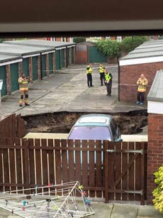 20ft sinkhole swallows up residential street in Newcastle