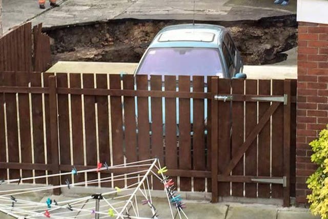 The sinkhole in Craster Square in Gosforth sucked up a car