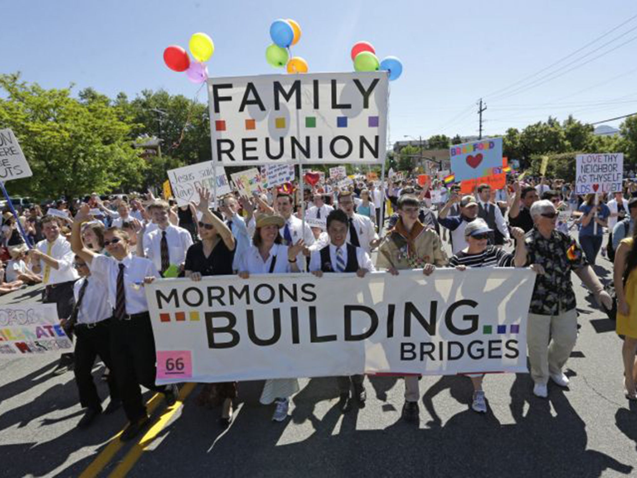 Members of the Mormon church march during the Utah Gay Pride Parade in Salt Lake City in 2013. LGBTQ Mormons and their supporters are reeling over a new rule change by church officials
