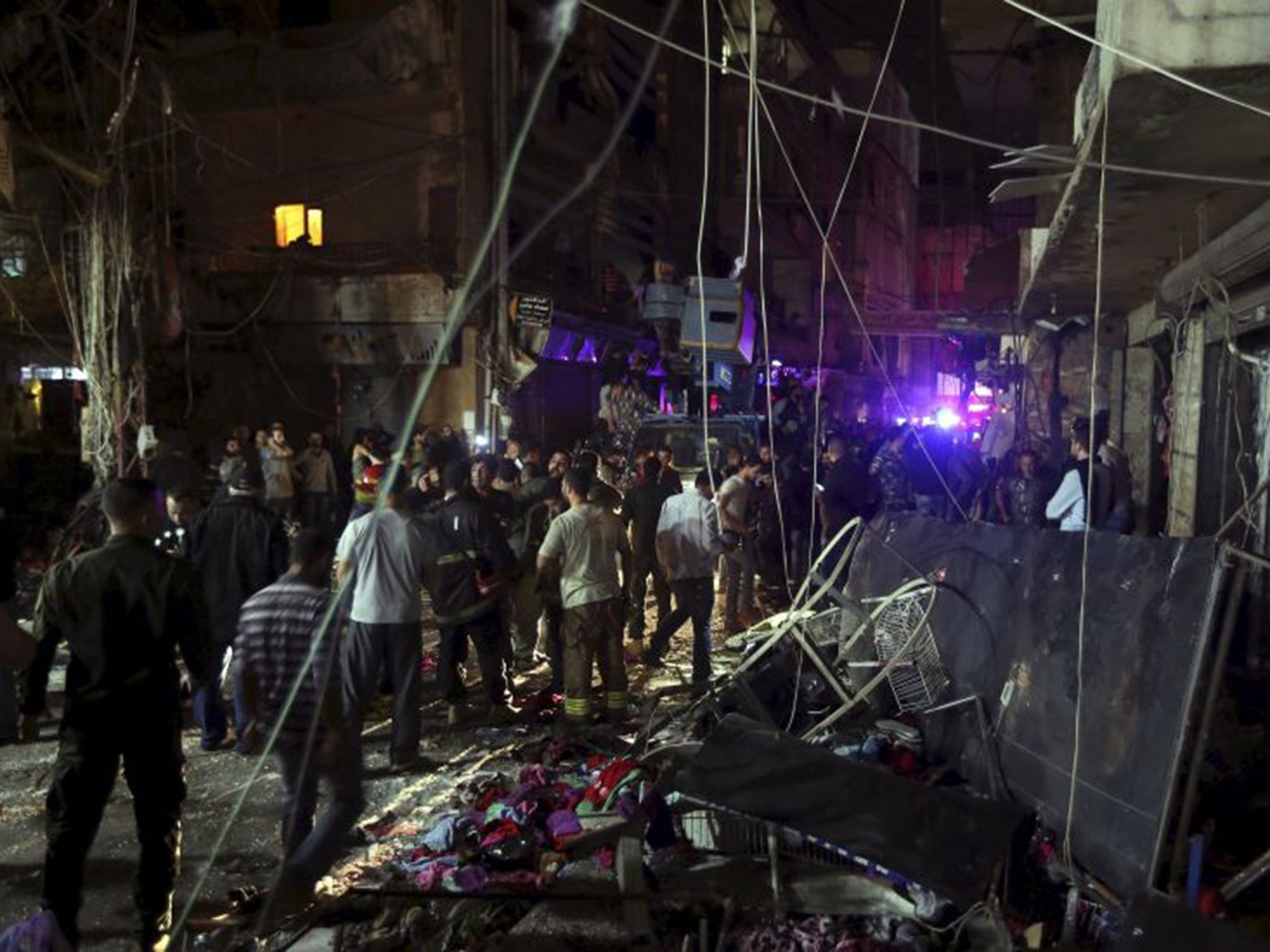 Reports state at least 37 people have been killed in two suicide explosions in a busy area in Beirut's southern suburbs