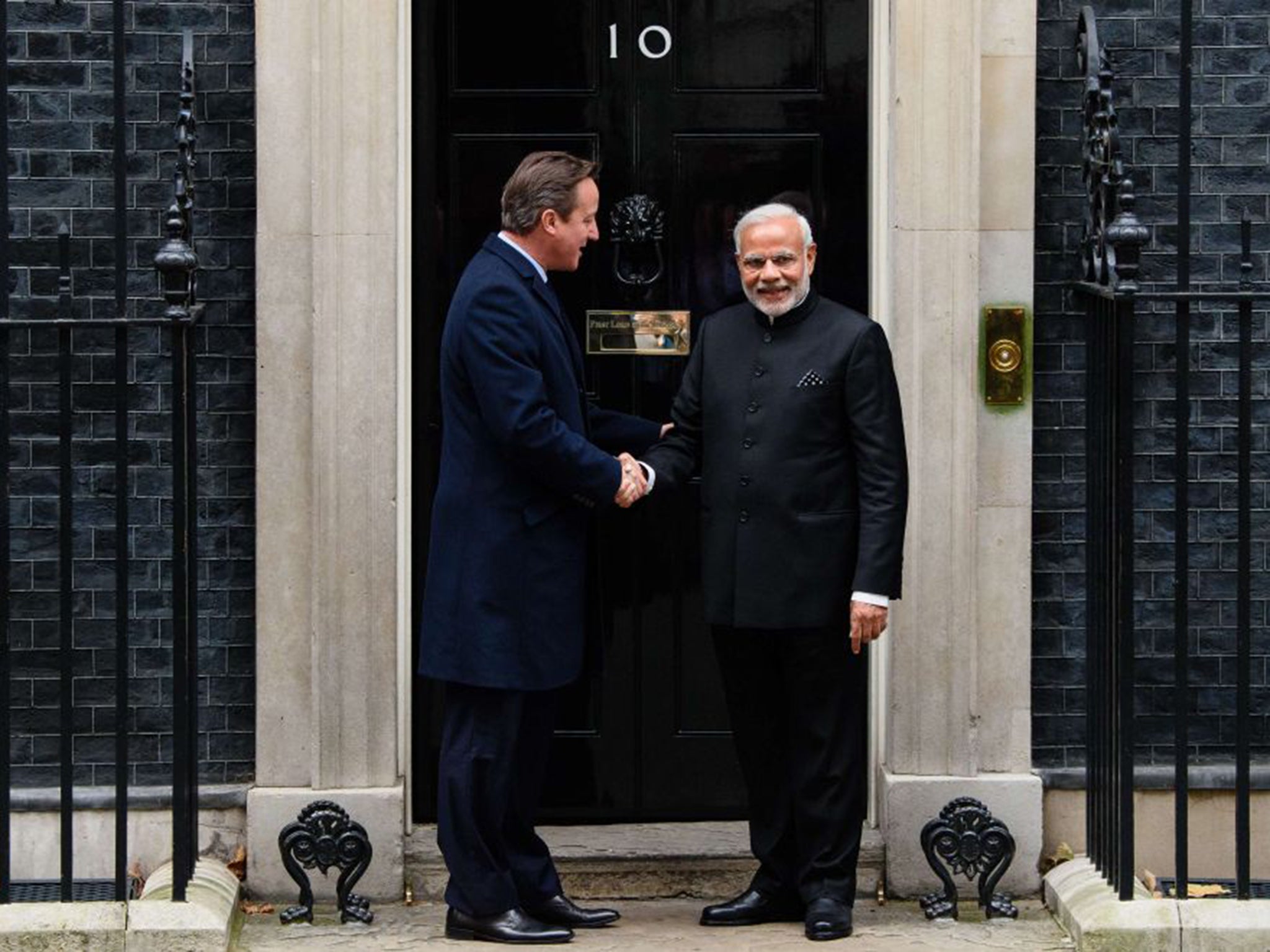 Narendra Modi was met by David Cameron at Downing Street