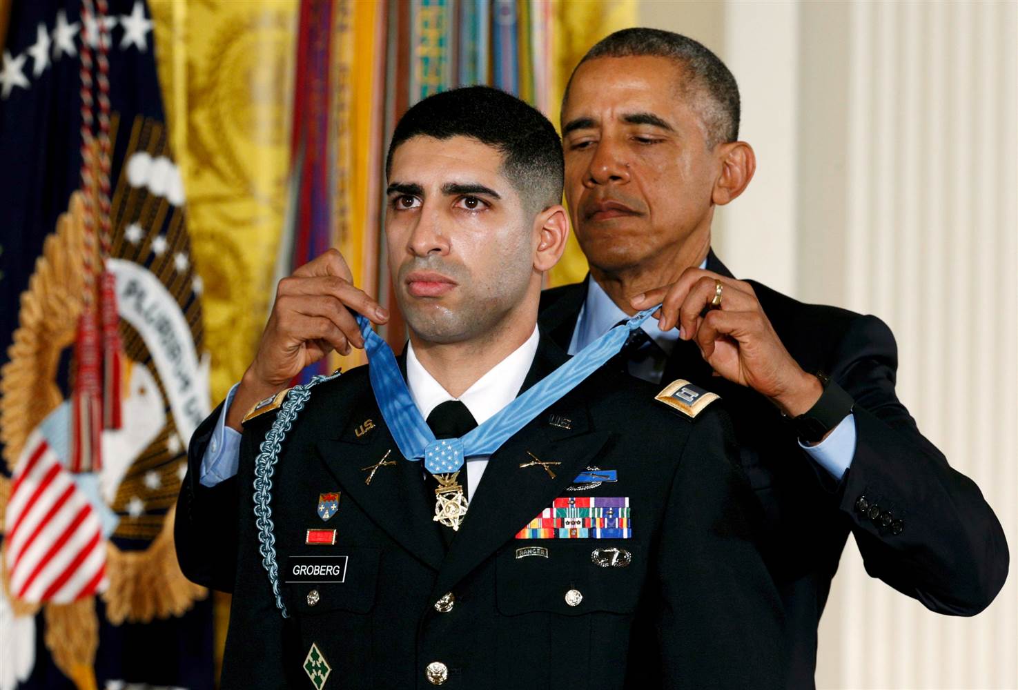 President Barack Obama awards US Army Captain Florent Groberg with the nation's highest honour.