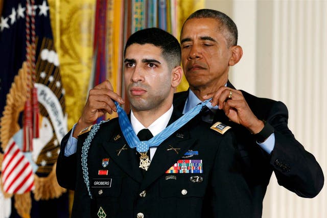 President Barack Obama awards US Army Captain Florent Groberg with the nation's highest honour.