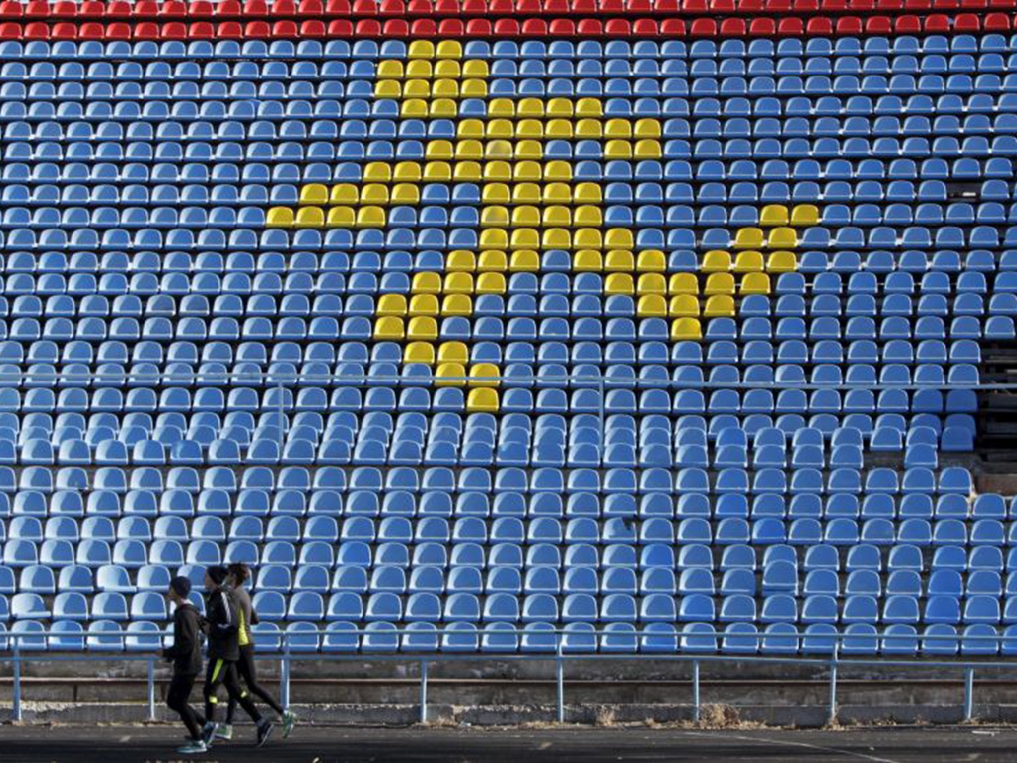 Sportsmen train at a local stadium in the southern city of Stavropol, Russia